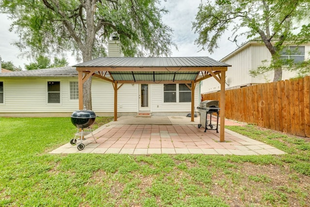 view of patio / terrace with a gazebo and grilling area