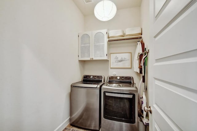 laundry area with washer and clothes dryer