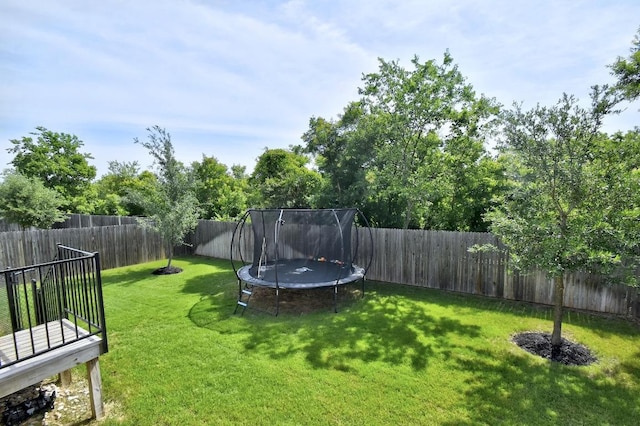 view of yard featuring a trampoline
