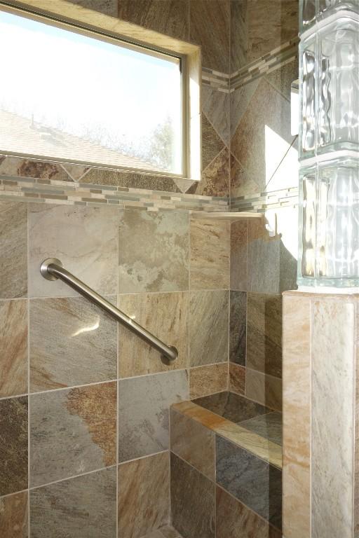 818 Caprock Canyon Trl, Georgetown, TX 78633 - bathroom with a tile shower