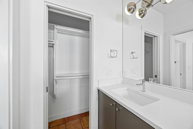 bathroom featuring tile patterned floors and vanity