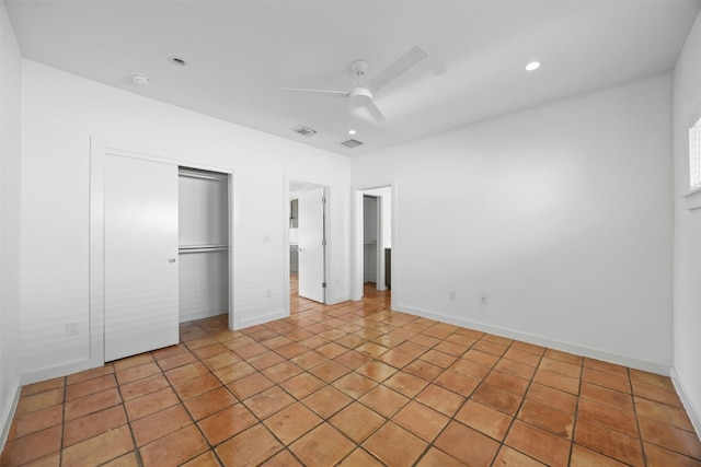 unfurnished bedroom with a closet, recessed lighting, baseboards, and ceiling fan