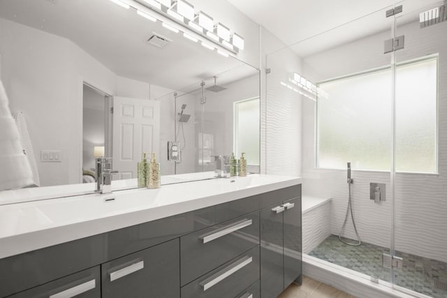 9127 Edwardson Ln, Austin, TX 78749 - full bathroom featuring a shower stall, double vanity, and a bathtub