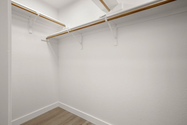 9127 Edwardson Ln, Austin, TX 78749 - spacious closet featuring light wood-type flooring