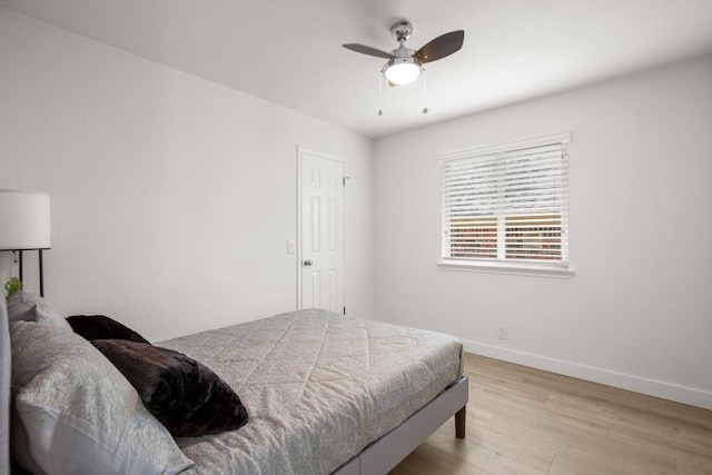 9127 Edwardson Ln, Austin, TX 78749 - bedroom featuring light wood-style floors and ceiling fan