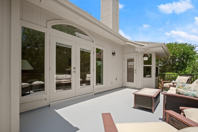9127 Edwardson Ln, Austin, TX 78749 - view of patio / terrace with french doors and an outdoor living space