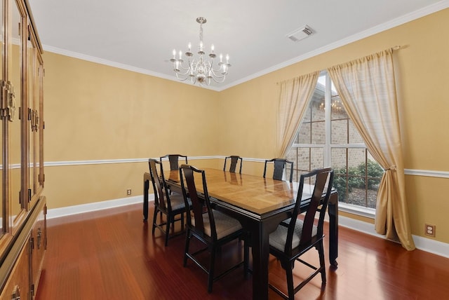 8105 Red Bird Ct, Austin, TX 78726 - dining space featuring dark wood finished floors, a chandelier, and crown molding