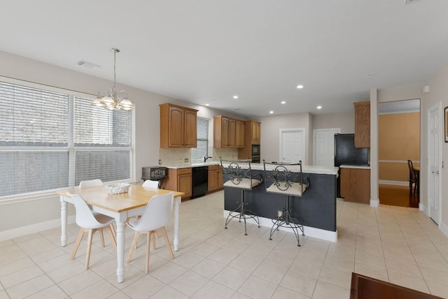 8105 Red Bird Ct, Austin, TX 78726 - dining space with a chandelier, light tile patterned floors, and recessed lighting
