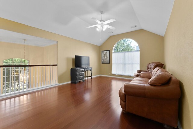 8105 Red Bird Ct, Austin, TX 78726 - living room with a ceiling fan, wood finished floors, and vaulted ceiling