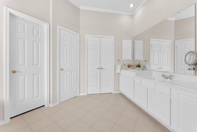 8105 Red Bird Ct, Austin, TX 78726 - full bathroom featuring ornamental molding, vanity, tile patterned floors, and a closet
