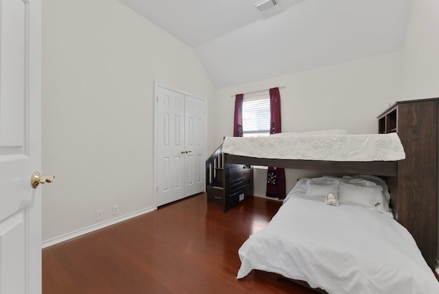 8105 Red Bird Ct, Austin, TX 78726 - bedroom with wood finished floors, vaulted ceiling, and a closet