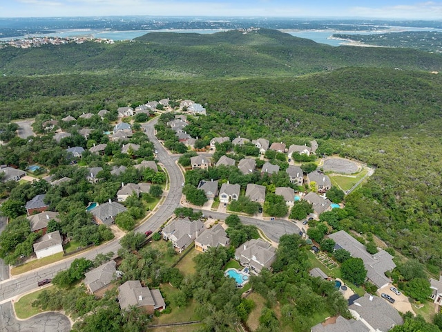 8105 Red Bird Ct, Austin, TX 78726 - aerial view of property and surrounding area with nearby suburban area