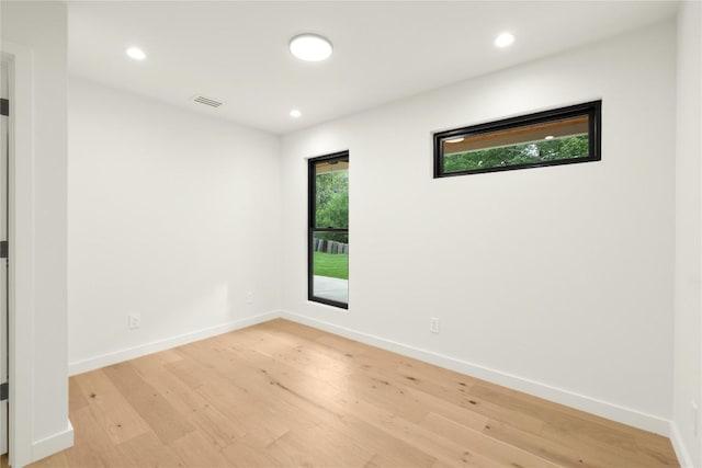 620 Bermuda St, Lakeway, TX 78734 - spare room featuring light wood-type flooring, baseboards, and recessed lighting