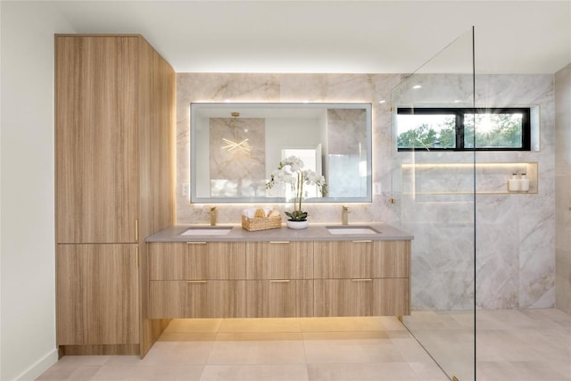 bathroom with double vanity, walk in shower, and tile patterned flooring