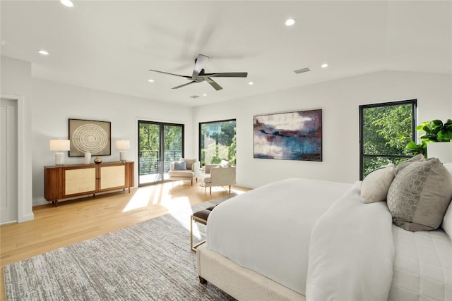 bedroom with multiple windows, light wood-type flooring, recessed lighting, ceiling fan, and access to exterior