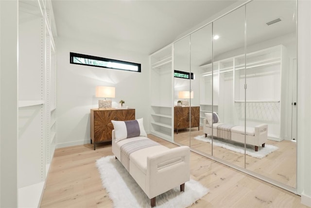 620 Bermuda St, Lakeway, TX 78734 - bedroom with a closet and wood finished floors