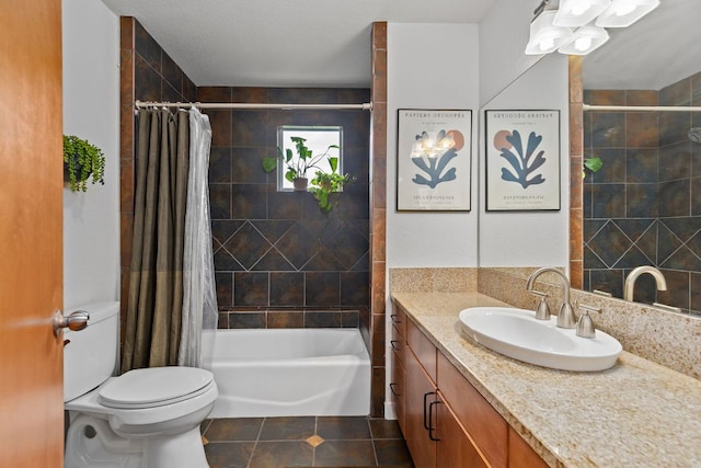 full bathroom featuring shower / tub combo with curtain, vanity, toilet, and tile patterned floors