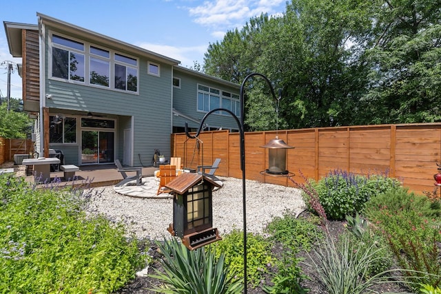 back of house featuring fence, a patio, and a ceiling fan