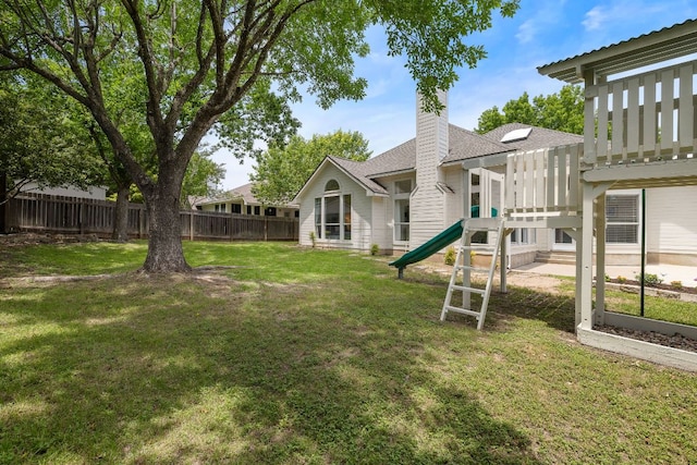 view of yard with a playground