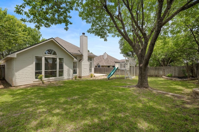 view of yard featuring a playground