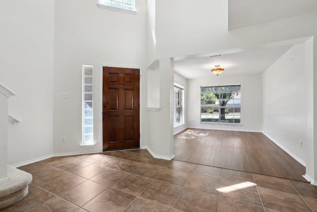 2912 Sydney Dr, Austin, TX 78728 - tiled entrance foyer with plenty of natural light and a towering ceiling