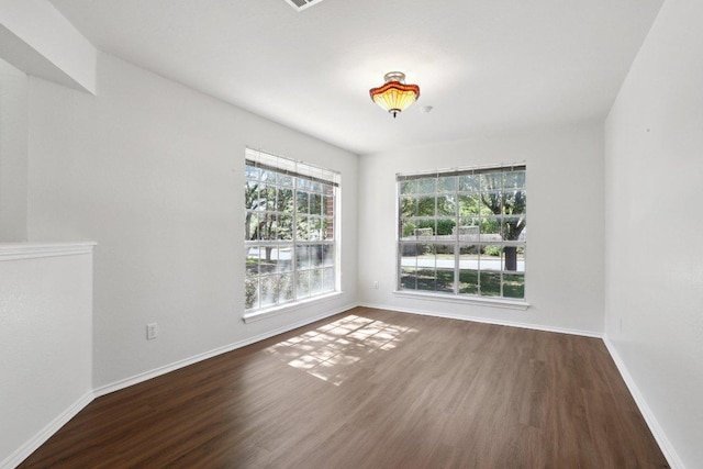 2912 Sydney Dr, Austin, TX 78728 - empty room featuring wood finished floors and baseboards