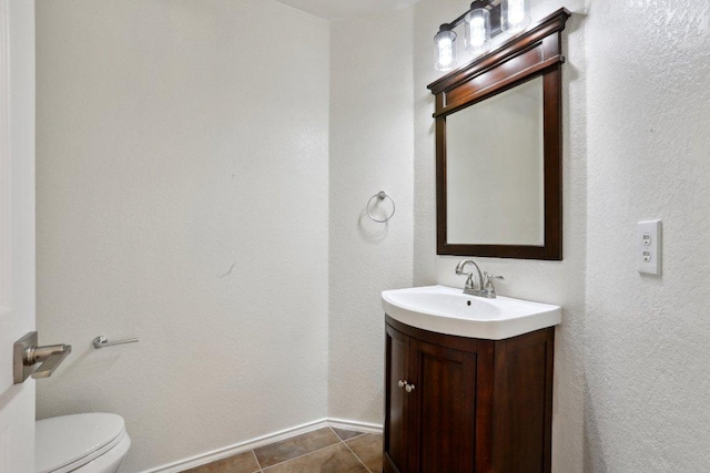 2912 Sydney Dr, Austin, TX 78728 - bathroom with vanity, toilet, and baseboards