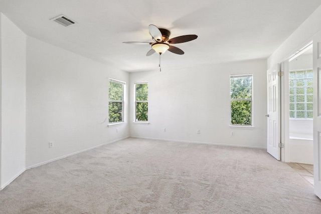 2912 Sydney Dr, Austin, TX 78728 - spare room with ceiling fan and light colored carpet