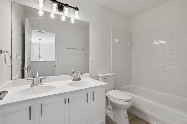2912 Sydney Dr, Austin, TX 78728 - full bath with toilet, double vanity, and bathing tub / shower combination