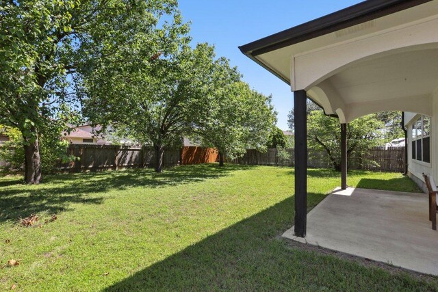 2912 Sydney Dr, Austin, TX 78728 - fenced backyard with a patio