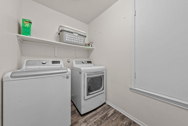 607 Big Bend Trl, Taylor, TX 76574 - washroom with washing machine and clothes dryer, dark wood-type flooring, and baseboards