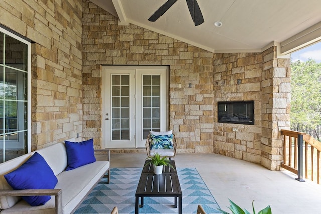 view of patio / terrace featuring an outdoor living space and ceiling fan