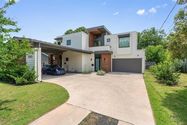 2003 Karen Ave Unit A, Austin, TX 78757 - contemporary house with driveway, an attached garage, and a front yard
