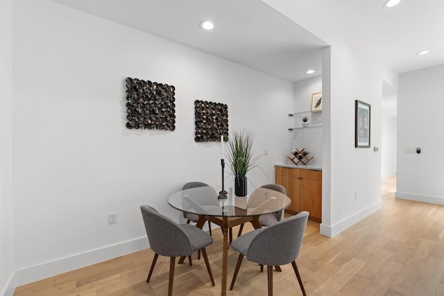 2003 Karen Ave Unit A, Austin, TX 78757 - dining space featuring light wood-type flooring, recessed lighting, and baseboards