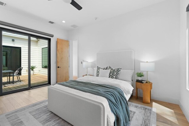 2003 Karen Ave Unit A, Austin, TX 78757 - bedroom featuring access to outside, wood finished floors, baseboards, recessed lighting, and a ceiling fan