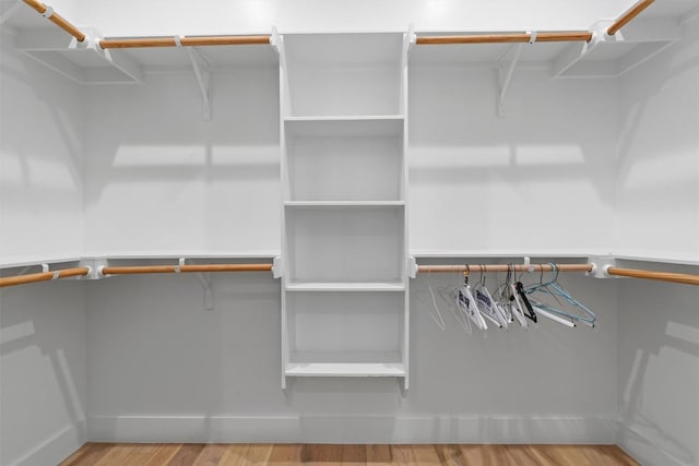 2003 Karen Ave Unit A, Austin, TX 78757 - walk in closet featuring wood finished floors