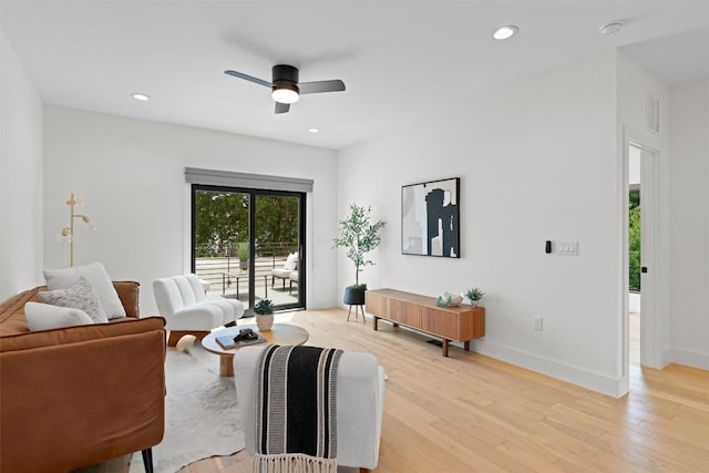 2003 Karen Ave Unit A, Austin, TX 78757 - living room with light wood-style floors, a ceiling fan, baseboards, and recessed lighting