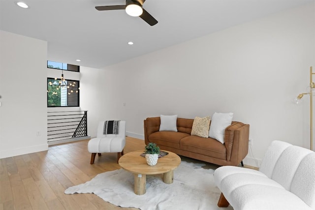 2003 Karen Ave Unit A, Austin, TX 78757 - living area with a chandelier, baseboards, light wood finished floors, recessed lighting, and a ceiling fan