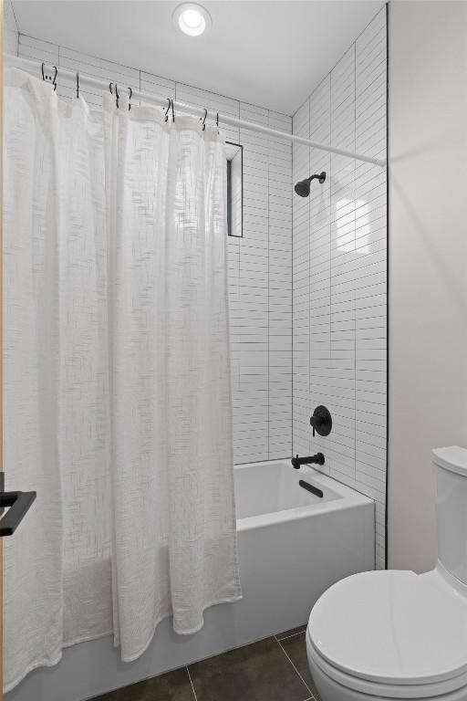 2003 Karen Ave Unit A, Austin, TX 78757 - full bathroom with toilet, tile patterned flooring, and shower / bath combination with curtain