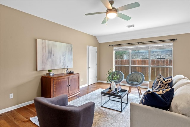 2415 Arbor Dr, Round Rock, TX 78681 - living room featuring baseboards, wood finished floors, ceiling fan, and vaulted ceiling