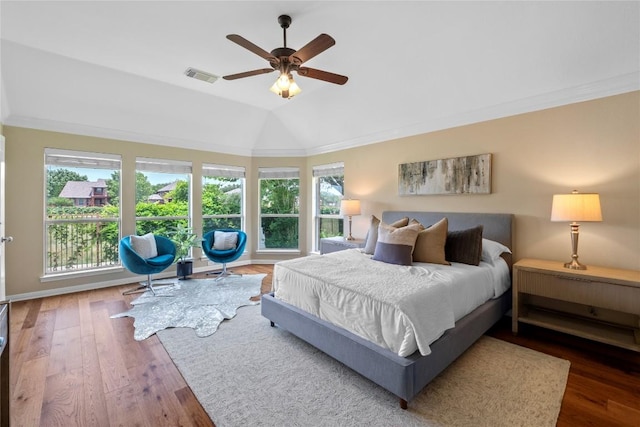 2415 Arbor Dr, Round Rock, TX 78681 - bedroom with wood finished floors, vaulted ceiling, and ceiling fan