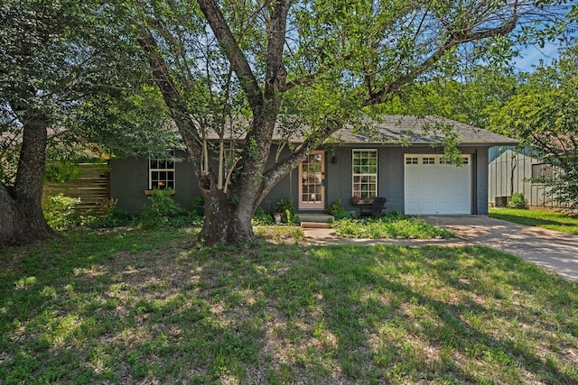 1644 Chippeway Ln, Austin, TX 78745 - view of front of house with driveway and an attached garage