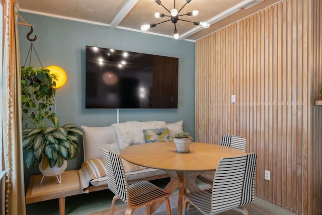 1644 Chippeway Ln, Austin, TX 78745 - dining room featuring a chandelier and ornamental molding