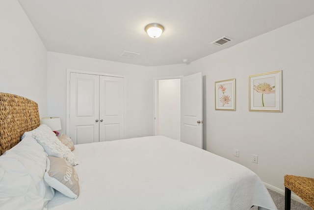 4418 Royal Oak Blvd, San Marcos, TX 78666 - carpeted bedroom with a closet and baseboards