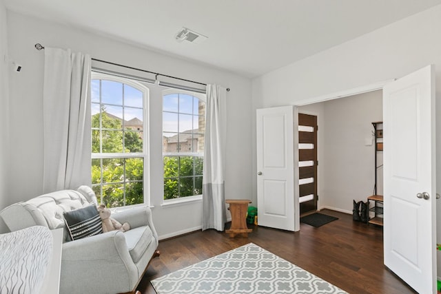 4418 Royal Oak Blvd, San Marcos, TX 78666 - sitting room with dark wood-style floors and baseboards