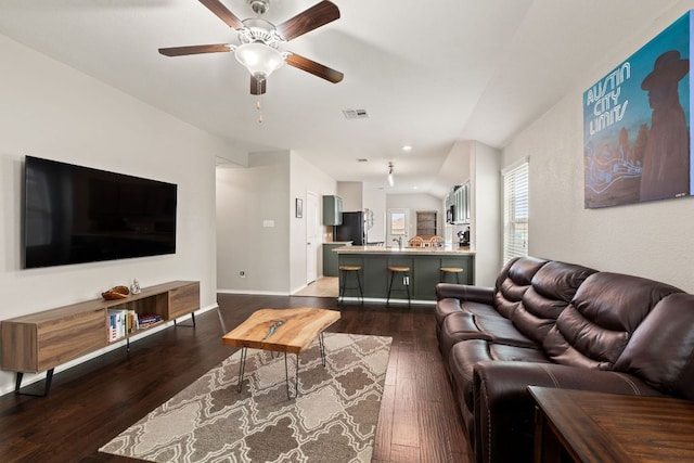 200 Circle Way Unit 8E, Jarrell, TX 76537 - living room featuring dark wood-style flooring, ceiling fan, and baseboards
