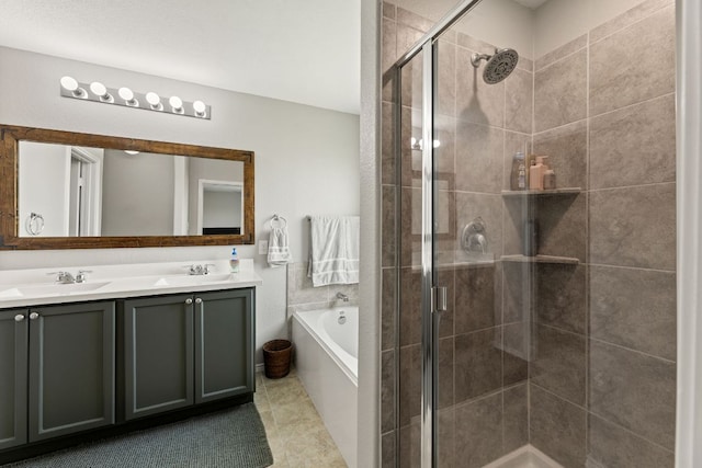 200 Circle Way Unit 8E, Jarrell, TX 76537 - bathroom with a stall shower, a garden tub, double vanity, and tile patterned flooring
