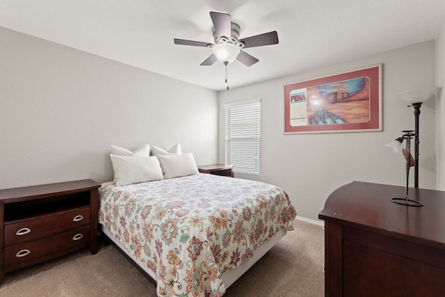 200 Circle Way Unit 8E, Jarrell, TX 76537 - bedroom with light colored carpet, a ceiling fan, and baseboards