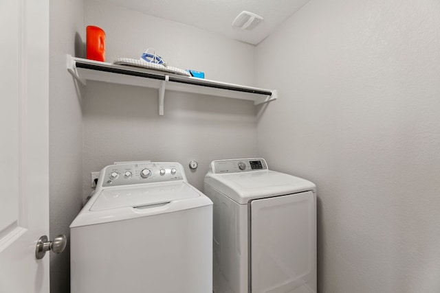 200 Circle Way Unit 8E, Jarrell, TX 76537 - laundry room with separate washer and dryer