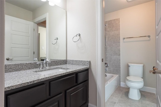 2713 Margarita Ct, Round Rock, TX 78665 - bathroom with vanity, toilet, washtub / shower combination, tile patterned floors, and baseboards